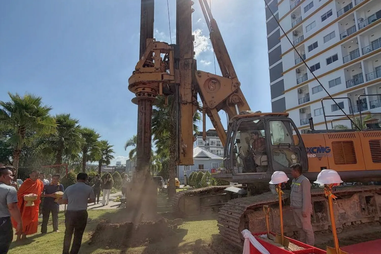 Project launch ceremony in Cambodia — developer site visit with piling rig